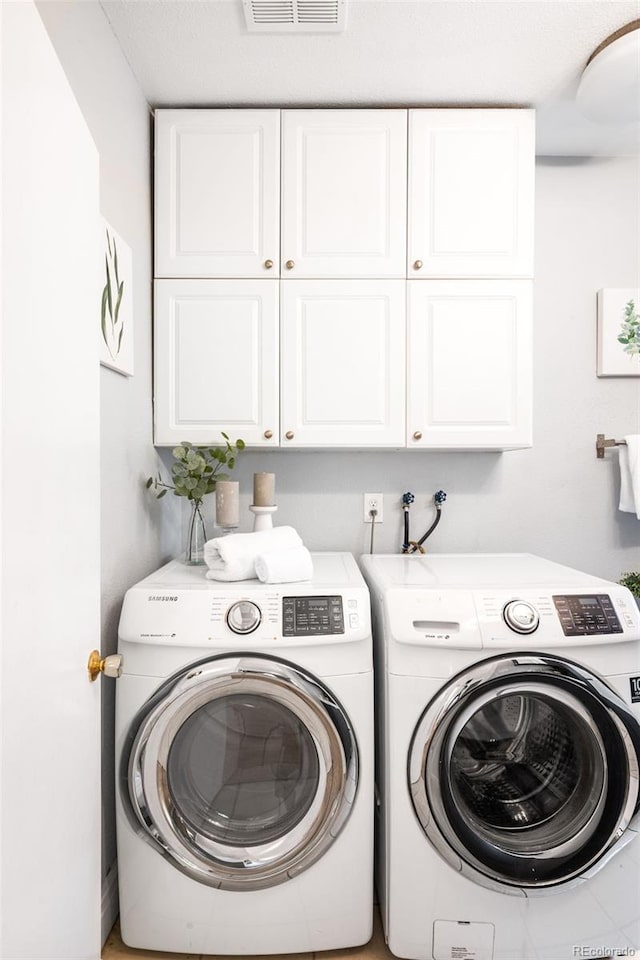 3375 W 37th Ave, Denver, CO 80211 - laundry area with cabinet space and independent washer and dryer