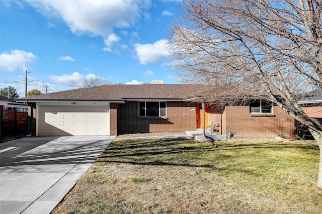 ranch-style home with a front yard and a garage