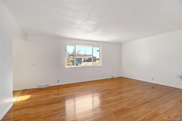 empty room featuring light wood-type flooring