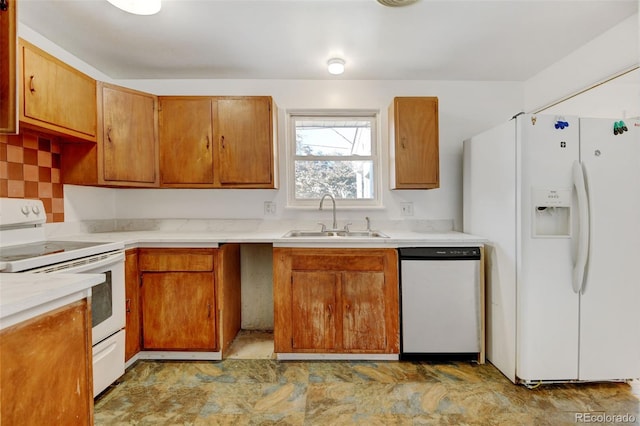 kitchen with white appliances and sink