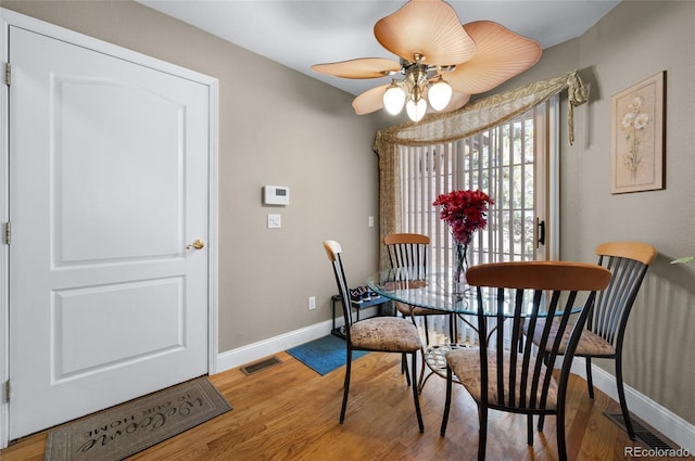 4529 Songglen Cir, Colorado Springs, CO 80906 - dining room featuring baseboards, wood finished floors, and a ceiling fan