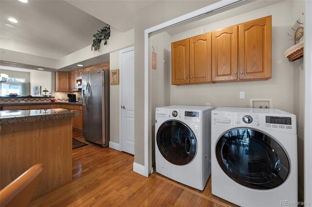 4529 Songglen Cir, Colorado Springs, CO 80906 - washroom featuring independent washer and dryer, light wood-type flooring, and recessed lighting