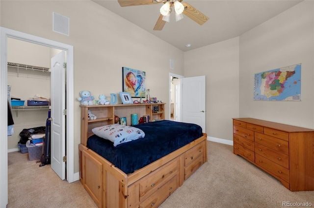 4529 Songglen Cir, Colorado Springs, CO 80906 - bedroom featuring light carpet, a walk in closet, baseboards, and a closet