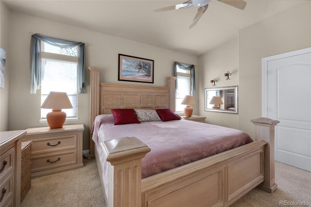 4529 Songglen Cir, Colorado Springs, CO 80906 - bedroom with light carpet, multiple windows, a ceiling fan, and lofted ceiling