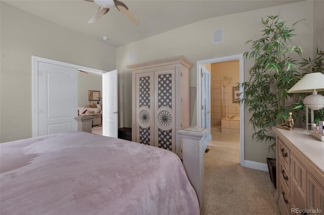 4529 Songglen Cir, Colorado Springs, CO 80906 - bedroom with light colored carpet, connected bathroom, and ceiling fan