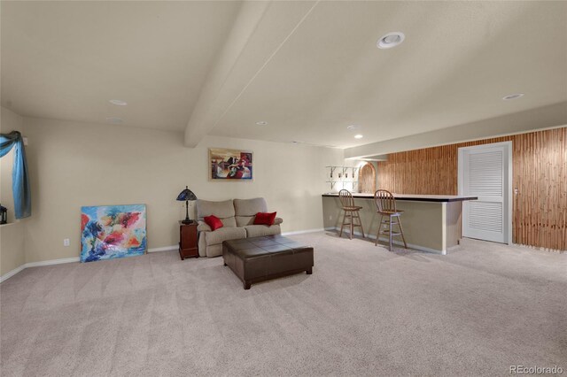 4529 Songglen Cir, Colorado Springs, CO 80906 - living area featuring bar area, light colored carpet, baseboards, recessed lighting, and beam ceiling