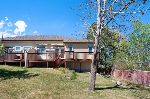 4529 Songglen Cir, Colorado Springs, CO 80906 - back of house with a deck and roof with shingles