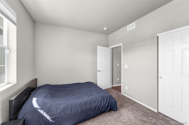 5996 Sun Mesa Cir, Castle Rock, CO 80104 - carpeted bedroom with baseboards and visible vents