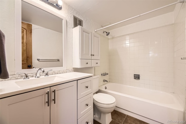 2469 S Xanadu Way Unit A, Aurora, CO 80014 - full bathroom with toilet, tile patterned flooring, vanity, and washtub / shower combination