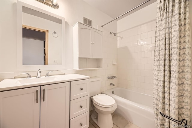 2469 S Xanadu Way Unit A, Aurora, CO 80014 - bathroom with shower / bathtub combination with curtain, toilet, vanity, and tile patterned floors