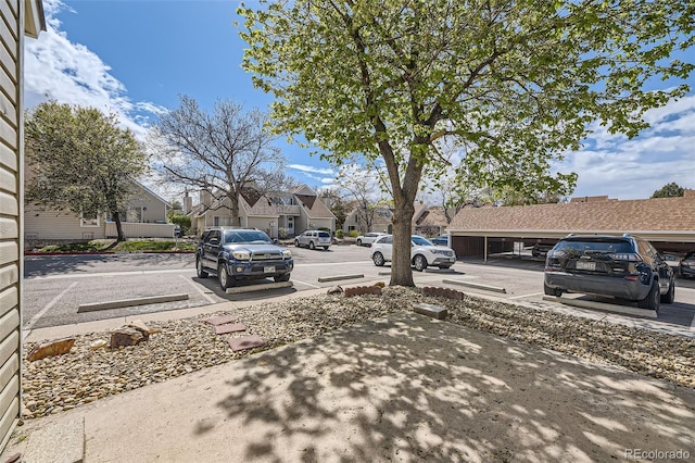 2469 S Xanadu Way Unit A, Aurora, CO 80014 - view of asphalt road with a residential view