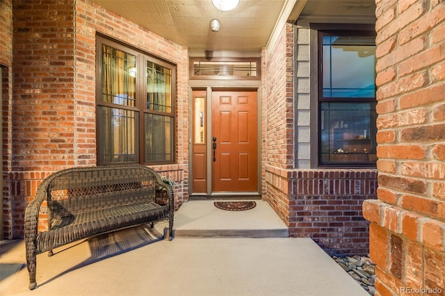236 E Fair Ln, Centennial, CO 80121 - view of exterior entry featuring brick siding and covered porch