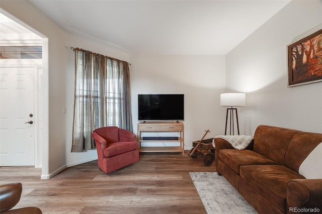 236 E Fair Ln, Centennial, CO 80121 - living area with wood finished floors and baseboards