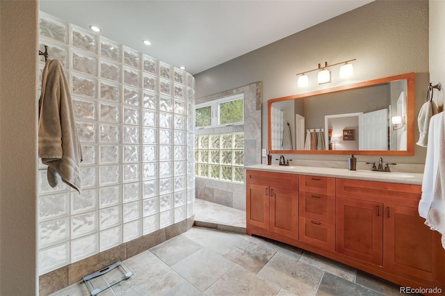 236 E Fair Ln, Centennial, CO 80121 - full bath with a walk in shower, double vanity, and recessed lighting