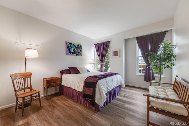 236 E Fair Ln, Centennial, CO 80121 - bedroom with wood finished floors and baseboards