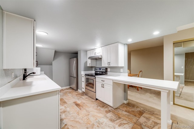 236 E Fair Ln, Centennial, CO 80121 - kitchen featuring stainless steel appliances, a sink, under cabinet range hood, a peninsula, and white cabinetry