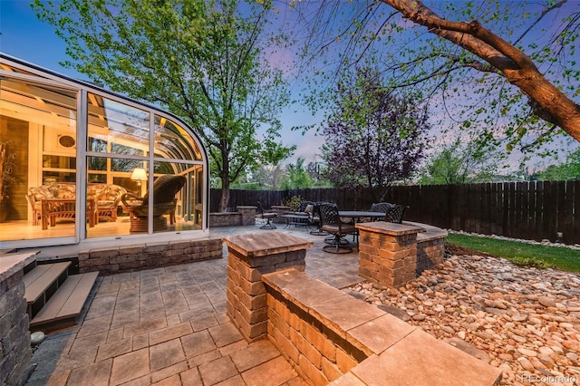 236 E Fair Ln, Centennial, CO 80121 - view of patio with an outdoor fire pit and a fenced backyard