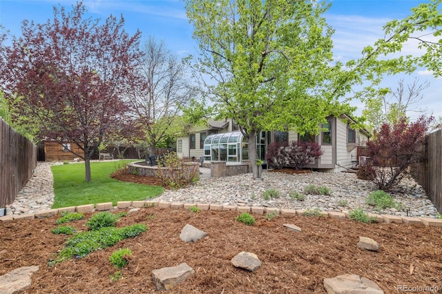 236 E Fair Ln, Centennial, CO 80121 - view of yard featuring a patio and a sunroom