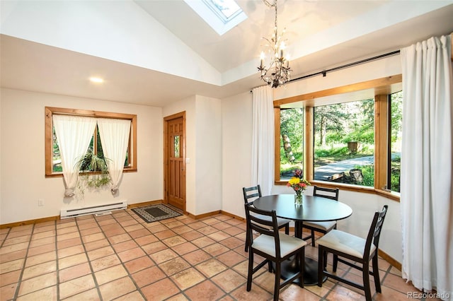 28192 Shadow Mountain Dr, Conifer, CO 80433 - dining space with baseboard heating, lofted ceiling, a skylight, a chandelier, and baseboards