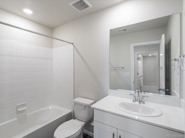 bathroom featuring visible vents, tub / shower combination, toilet, and vanity