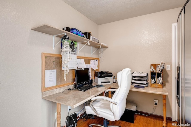 20341 E 48th Pl, Denver, CO 80249 - office space with wood finished floors and a textured ceiling