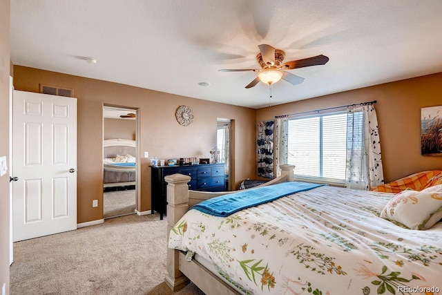 20341 E 48th Pl, Denver, CO 80249 - carpeted bedroom with baseboards and a ceiling fan
