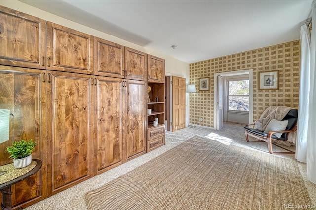 224 W Warren Ave, Cripple Creek, CO 80813 - sitting room with wallpapered walls and light colored carpet