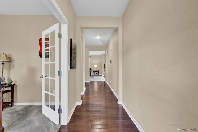 8489 S Quay St, Littleton, CO 80128 - corridor with baseboards and dark wood-style floors