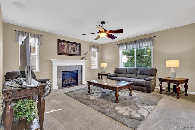 8489 S Quay St, Littleton, CO 80128 - living area featuring carpet flooring, ceiling fan, and a tile fireplace