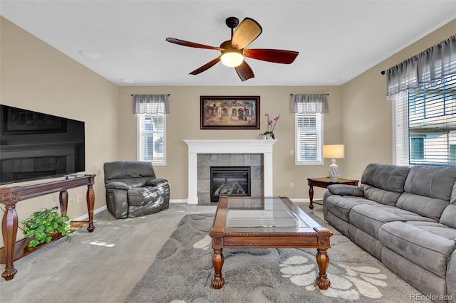 8489 S Quay St, Littleton, CO 80128 - carpeted living room with a tiled fireplace and a ceiling fan