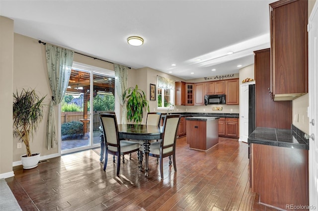 8489 S Quay St, Littleton, CO 80128 - dining room with dark wood-style floors and recessed lighting