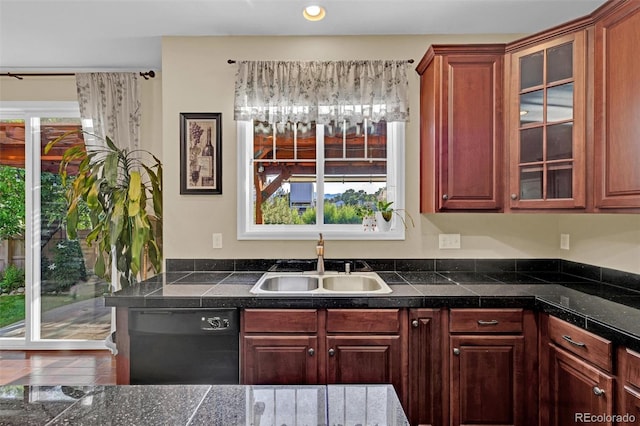 8489 S Quay St, Littleton, CO 80128 - kitchen with black dishwasher, tile countertops, glass insert cabinets, and recessed lighting