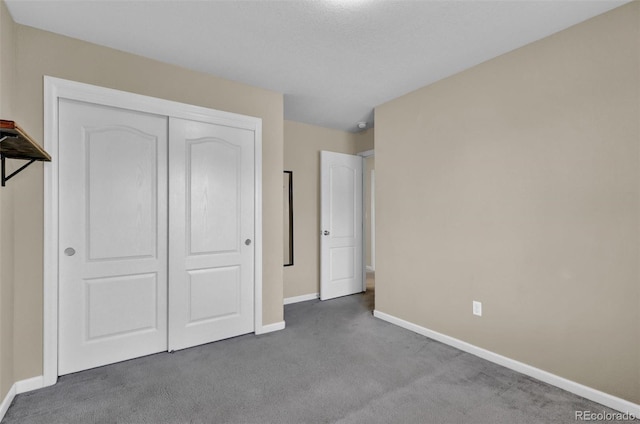 8489 S Quay St, Littleton, CO 80128 - unfurnished bedroom with carpet floors and a closet