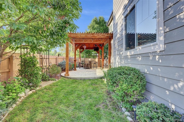 8489 S Quay St, Littleton, CO 80128 - fenced backyard with a pergola and a patio area