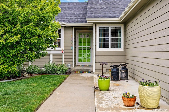 13313 Cherry Cir, Thornton, CO 80241 - entrance to property featuring a shingled roof and a patio area