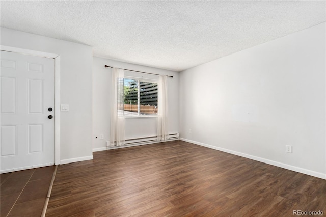 6011 Yarrow St Unit I, Arvada, CO 80004 - empty room with baseboard heating, wood finished floors, and a textured ceiling