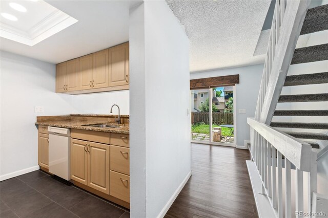 6011 Yarrow St Unit I, Arvada, CO 80004 - bar featuring white dishwasher, stairway, and a textured ceiling