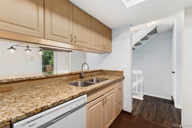 6011 Yarrow St Unit I, Arvada, CO 80004 - kitchen featuring white dishwasher, light stone countertops, dark wood-style flooring, and a skylight
