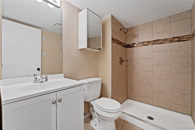 6011 Yarrow St Unit I, Arvada, CO 80004 - full bath featuring tiled shower, tile patterned flooring, and vanity