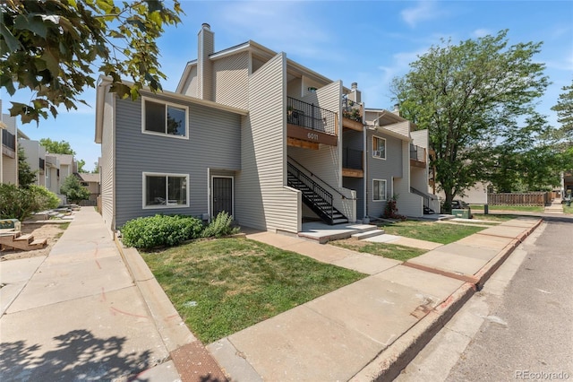6011 Yarrow St Unit I, Arvada, CO 80004 - view of building exterior featuring stairway