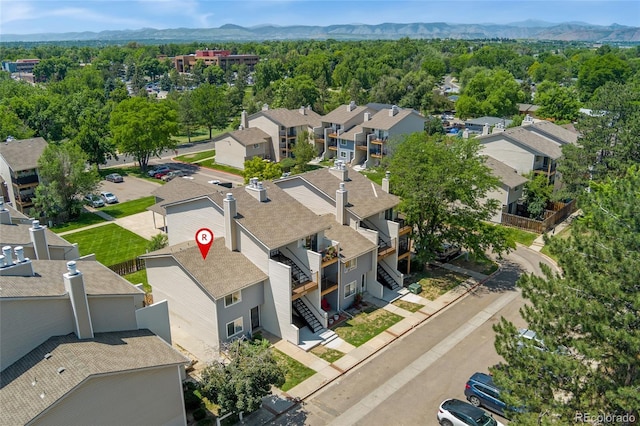 6011 Yarrow St Unit I, Arvada, CO 80004 - aerial perspective of suburban area with mountains