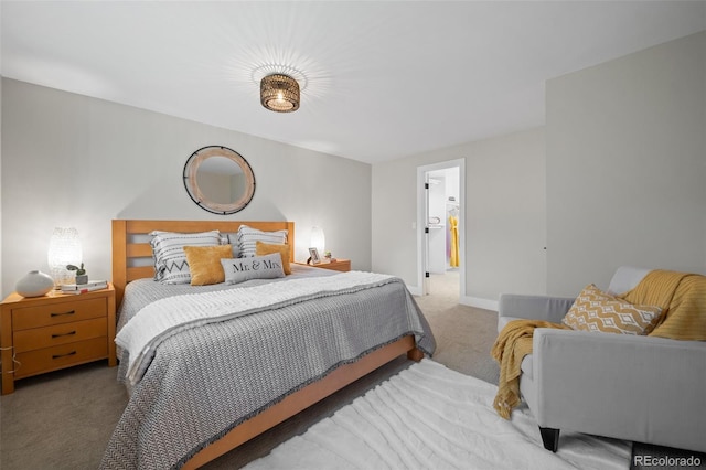 carpeted bedroom featuring baseboards