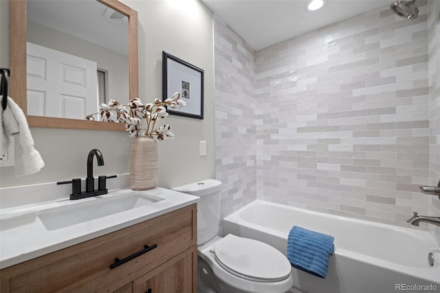 bathroom with toilet, vanity, washtub / shower combination, and recessed lighting