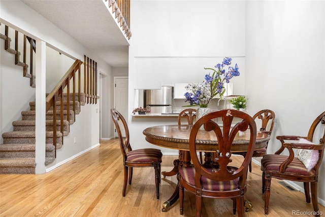 dining area featuring light hardwood / wood-style flooring