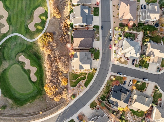 birds eye view of property featuring golf course view and a residential view