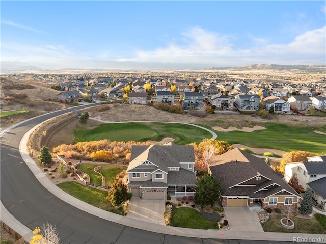 birds eye view of property with a residential view and golf course view