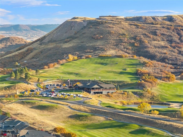 property view of mountains featuring view of golf course