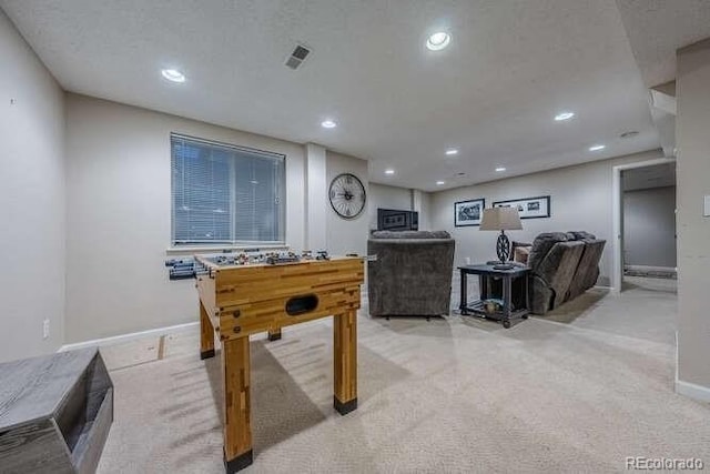 7176 S Pierson St, Littleton, CO 80127 - recreation room with carpet floors, recessed lighting, and baseboards