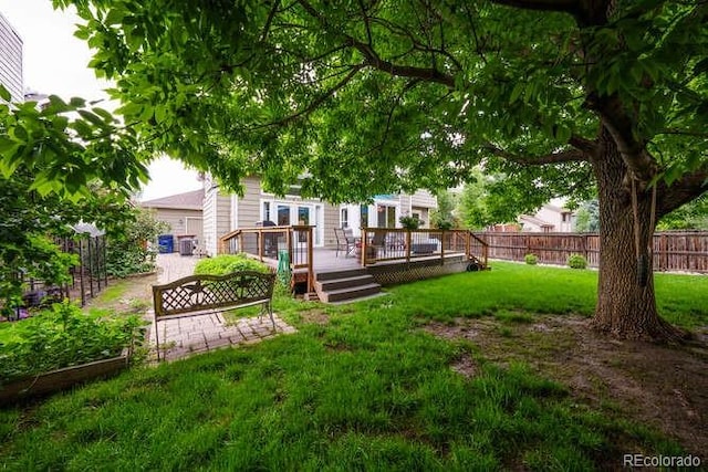 7176 S Pierson St, Littleton, CO 80127 - view of yard with a deck