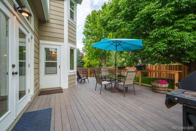 7176 S Pierson St, Littleton, CO 80127 - wooden deck featuring outdoor dining space